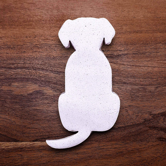 Dog-shaped cookie cutter with dough cutout on baking surface, perfect for pet-themed treats, parties, or homemade dog cookies – eco-friendly and handmade.