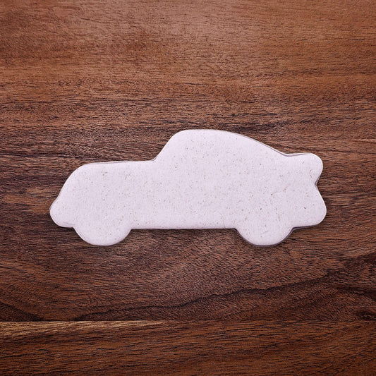 Racecar cookie dough cutout, perfect for racing-themed birthday treats, car cookies, or fun fondant decorations.