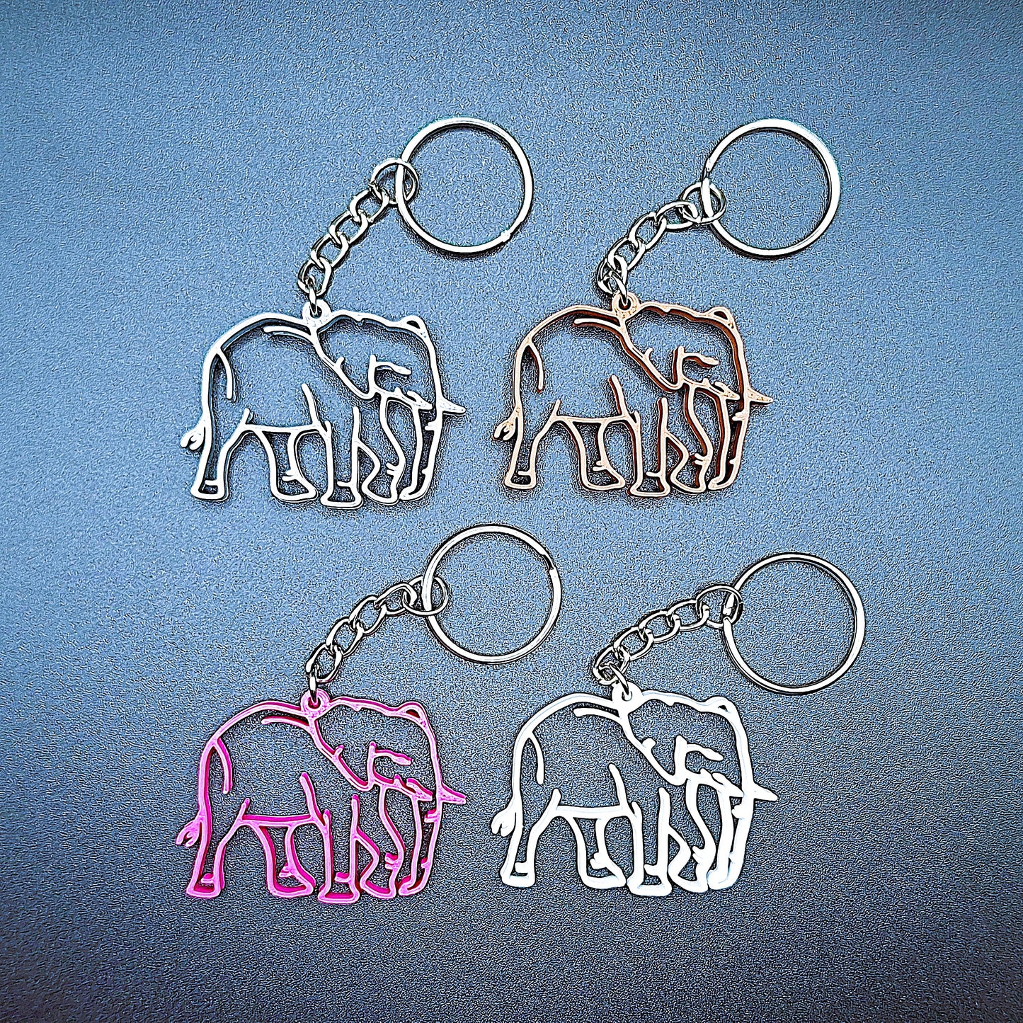 Adorable elephant keyring, lightweight and durable, ideal for party favors, gifts, and adding a playful wildlife touch to keys or backpacks.