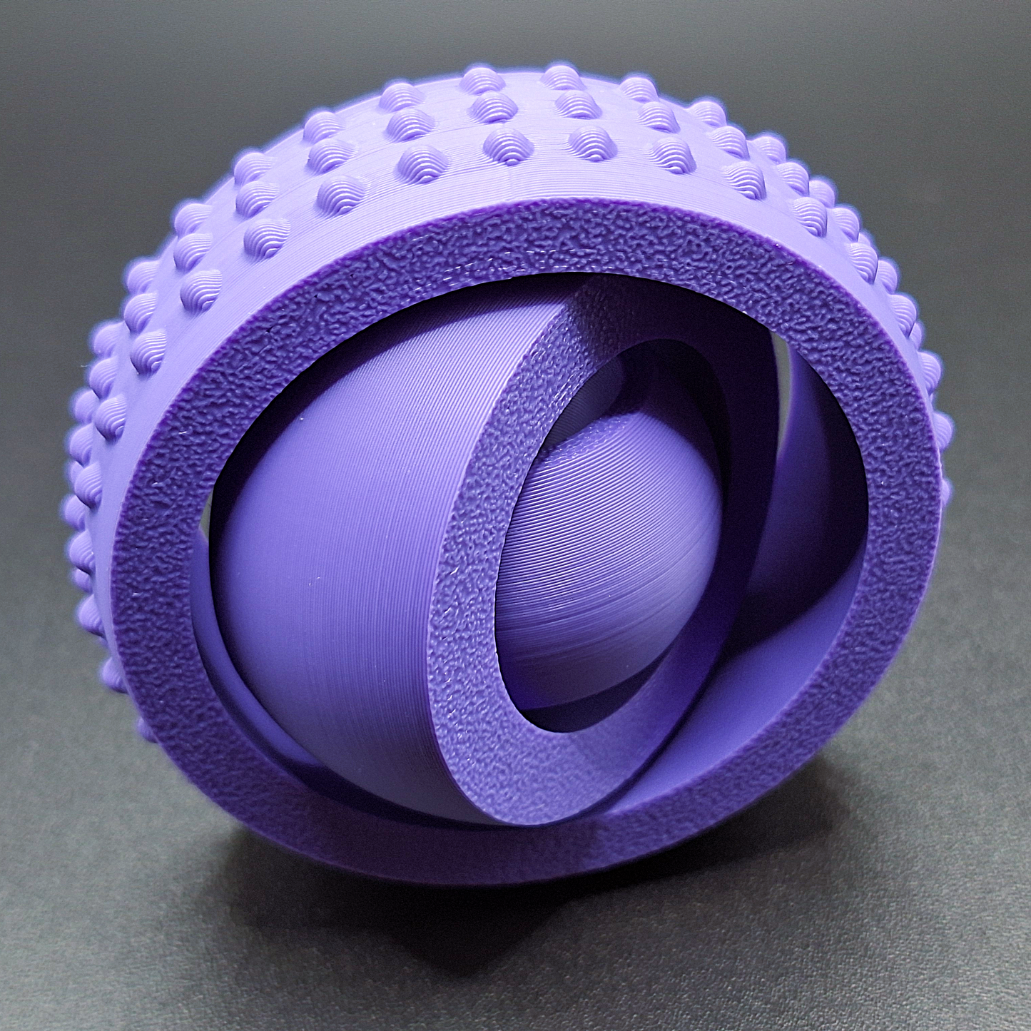 Purple fidget gyro spinner with modern design and smooth spin, handmade from eco PLA, great for stress relief, sensory play, and focus support.