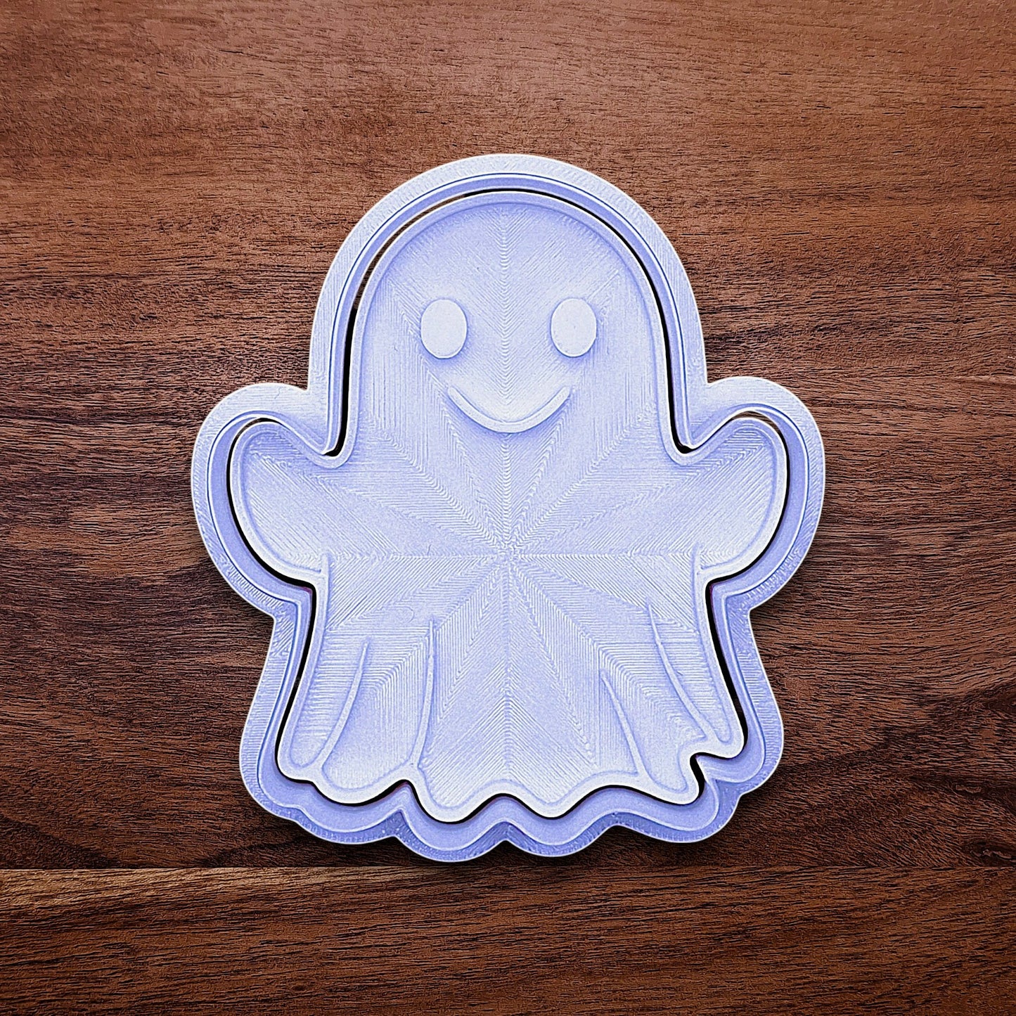 Ghost cookie cutter with stamp – adds spooky face details for Halloween cookies, fondant toppers, or fall baking fun.