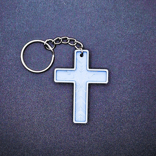 Front view of a blue-gray cross keychain, handmade and eco-friendly, perfect for church events, VBS, and faith-inspired gifts.