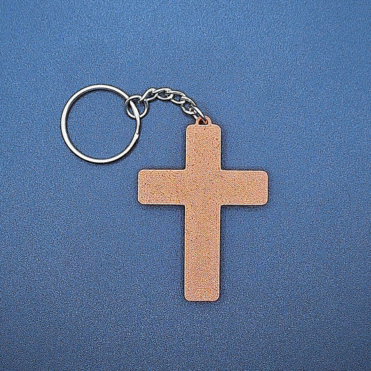 Front view of a brown cross keychain, eco-friendly and handcrafted, ideal for faith-based gifts, church events, and meaningful everyday accessories.