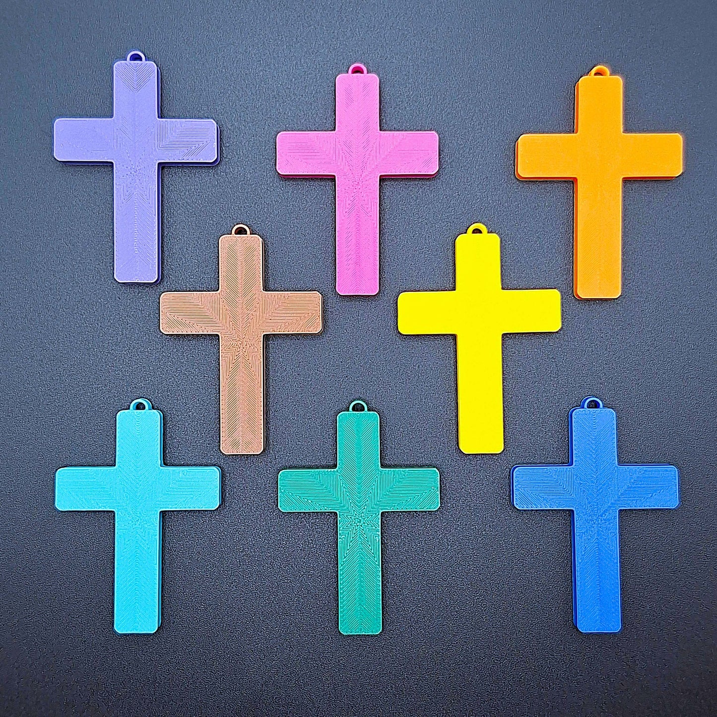 Front view of eight vibrant cross keychains, eco-friendly and handmade, ideal for VBS, church events, and meaningful faith-based gifts.