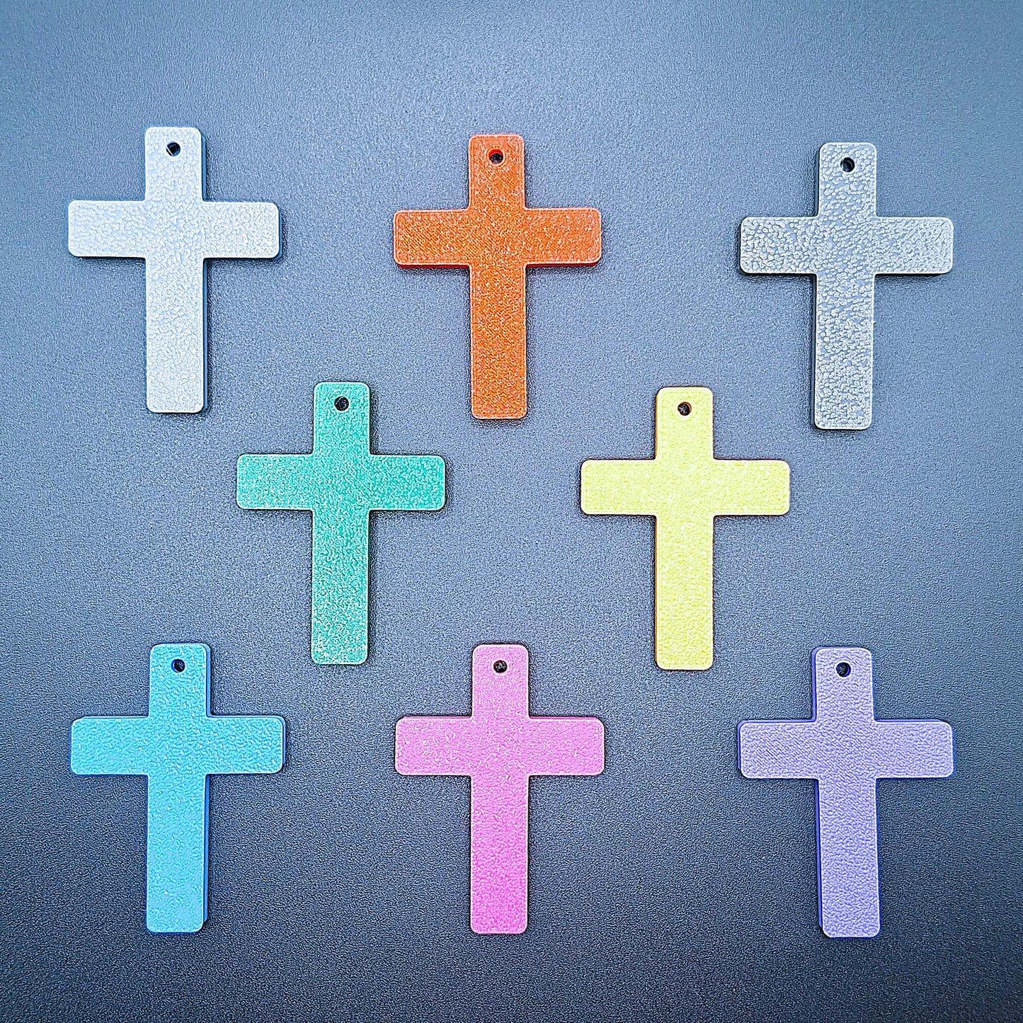 Reverse view of eight colorful cross keychains, eco-friendly and handmade, ideal for VBS, church events, and faith-inspired gifts.