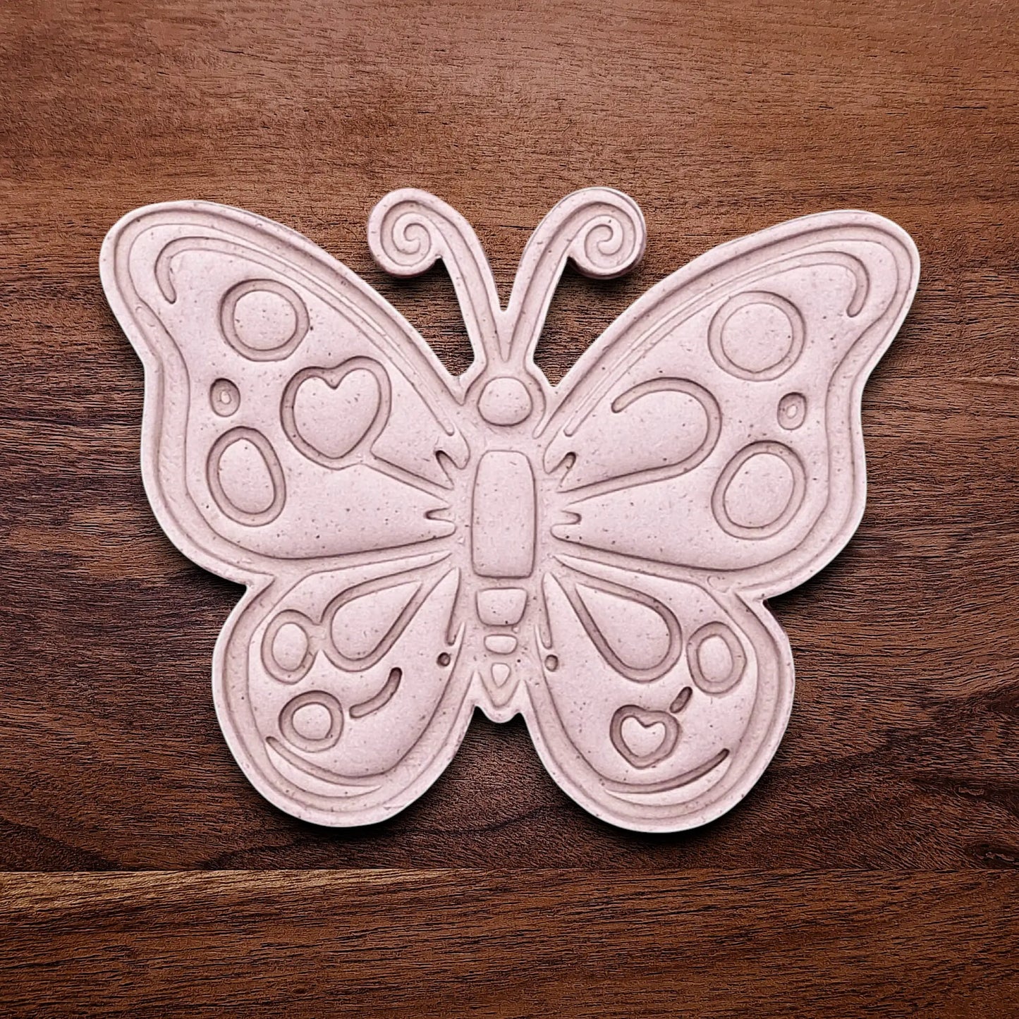 Handmade and customizable butterfly cookie cutter stamp dough cutout and imprint, perfect for spring baking, garden party treats, birthdays, events, weddings, fondant decorations, and whimsical cookie designs.