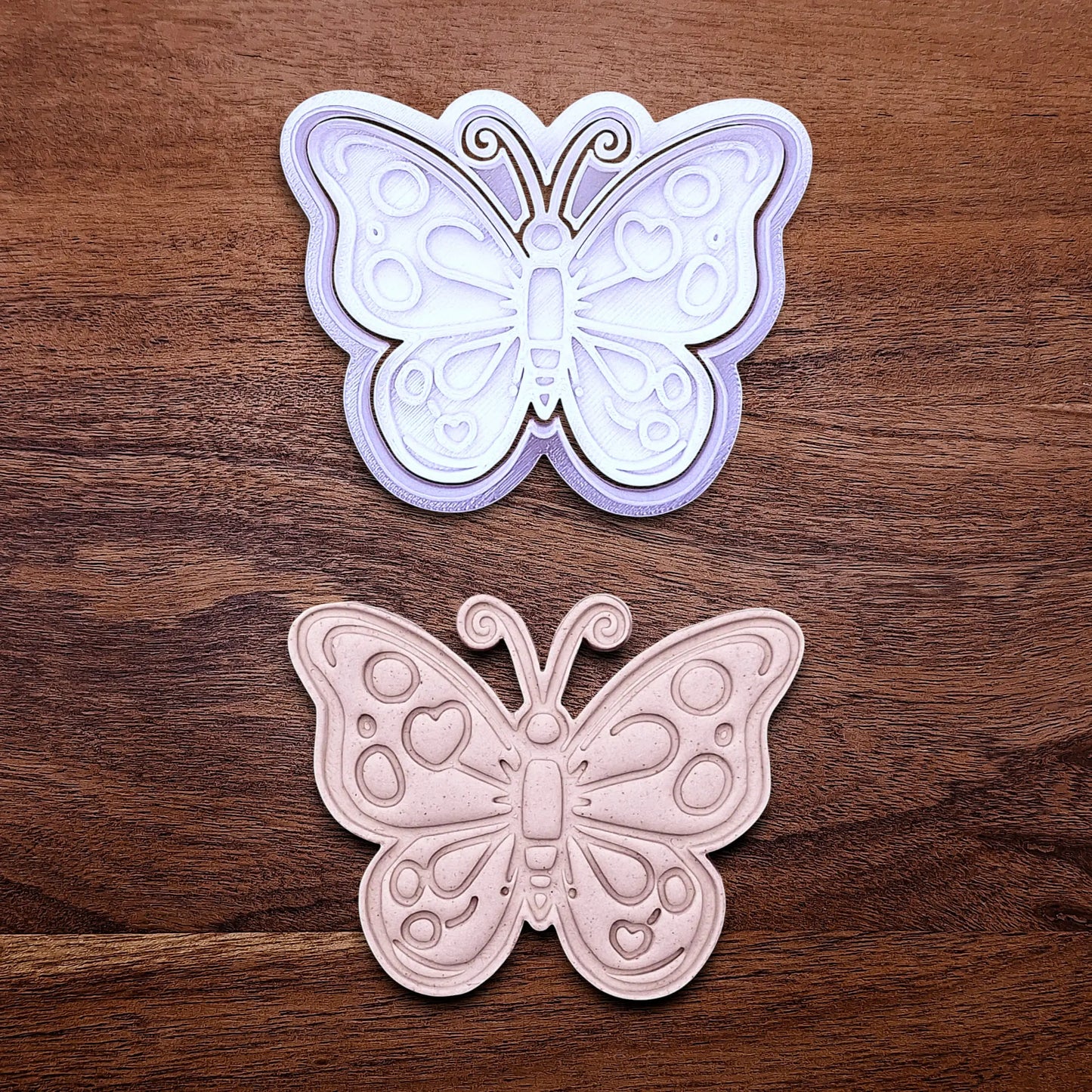 Handmade and customizable butterfly cookie cutter with stamp and dough cutout and imprint, perfect for spring baking, garden party treats, birthdays, events, weddings, fondant decorations, and whimsical cookie designs.