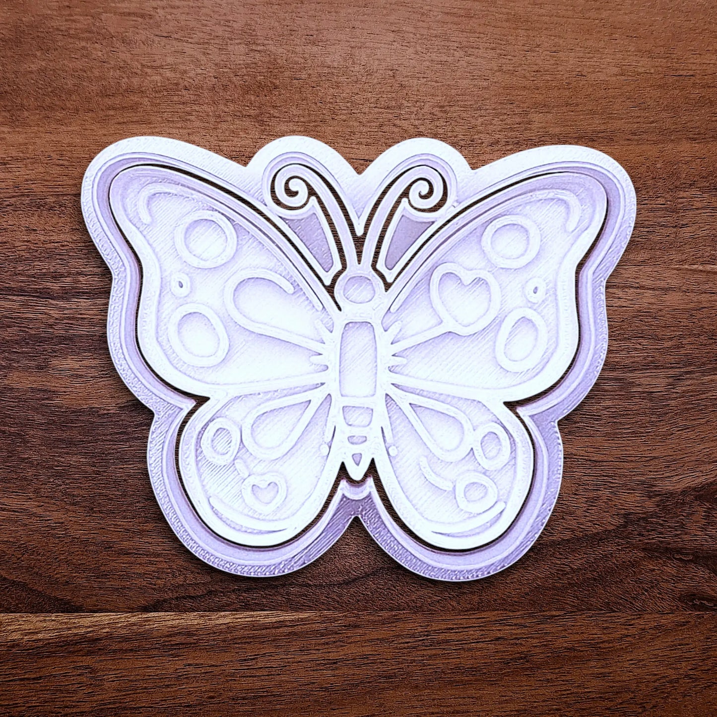 Handmade and customizable butterfly cookie cutter and stamp, perfect for spring baking, garden party treats, birthdays, events, weddings, fondant decorations, and whimsical cookie designs.