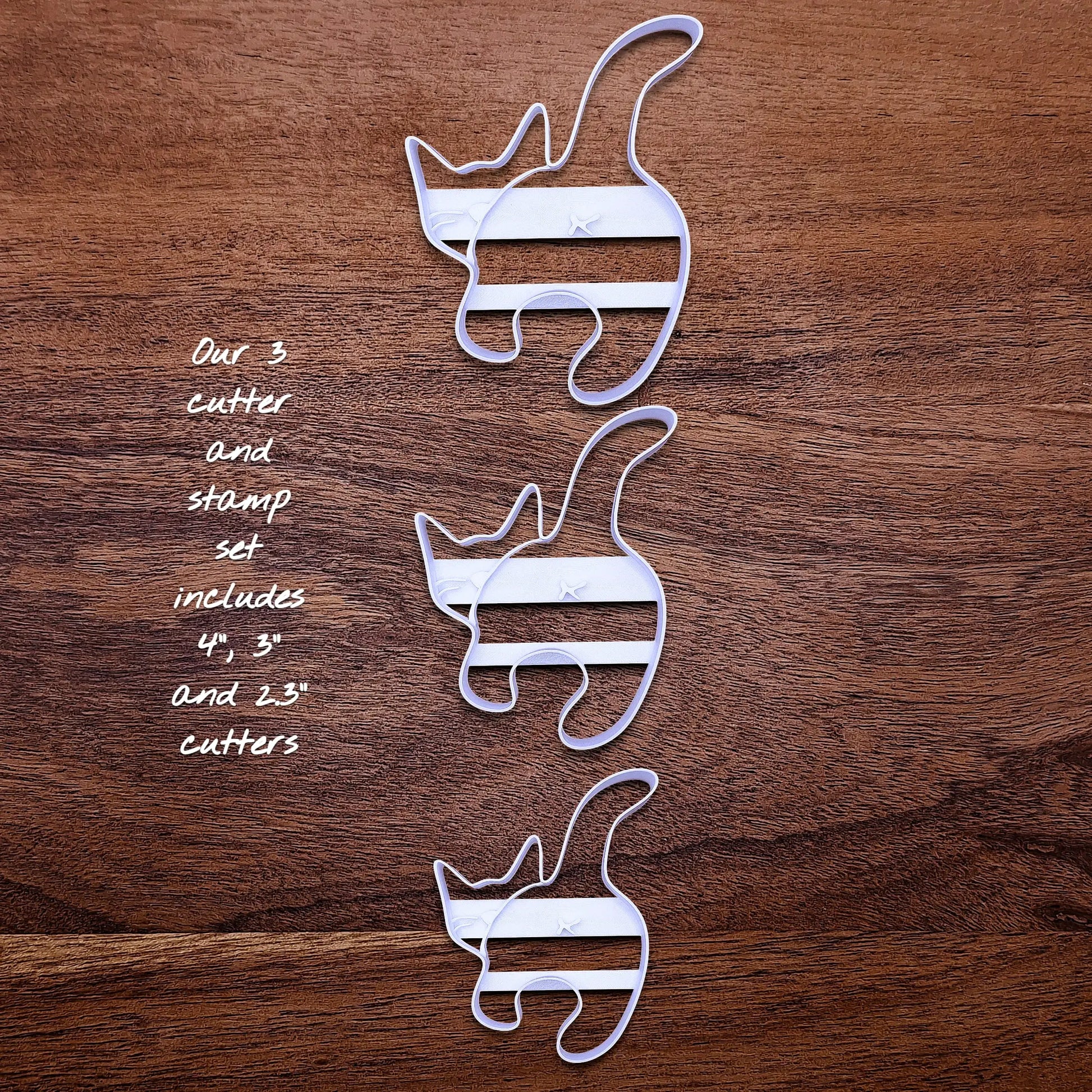 Front of three handmade and customizable cat butt cookie cutter baking molds, perfect for gifting, gag gifts, white elephant gifting, and cat themed parties and treats.