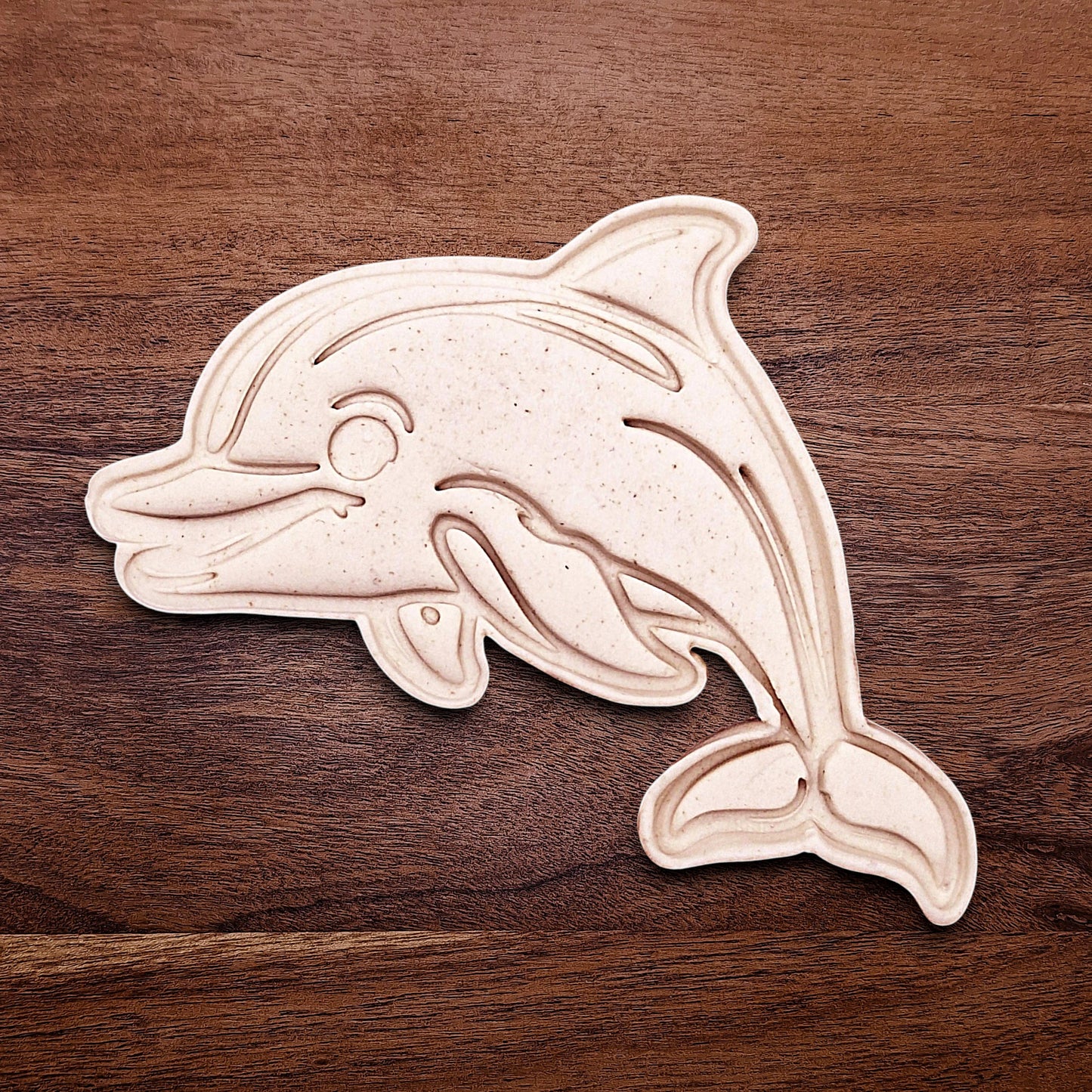 Handmade and customizable dolphin cookie cutter dough imprint, perfect for ocean-themed cookies, birthdays, aquatic fondant toppers, and sea animal baking projects.