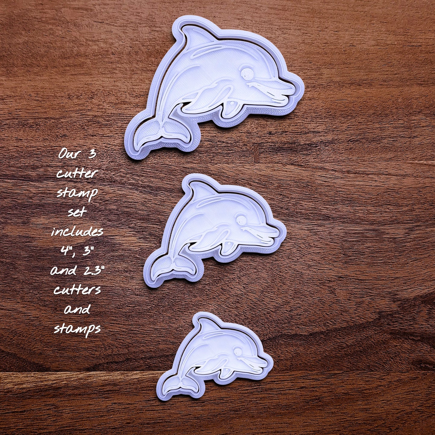 Handmade and customizable dolphin cookie cutter stamp set in three sizes, perfect for ocean-themed cookies, birthdays, aquatic fondant toppers, and sea animal baking projects.