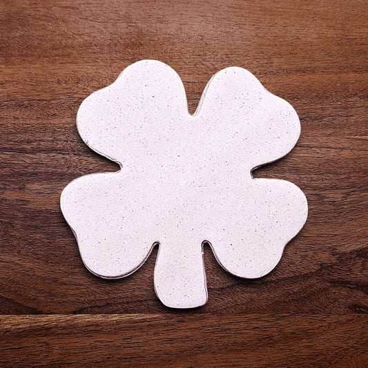 Handmade and customizable four-leaf clover cookie cutter dough cutout, perfect for St. Patrick’s Day baking, Irish themed celebrations and nature-inspired events.
