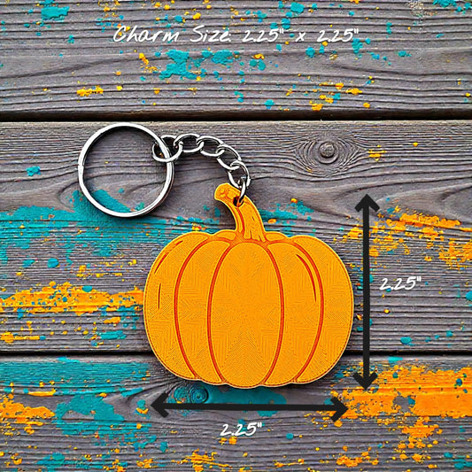 Handmade and customizable pumpkin keychain, ideal for fall themed party favors, cute bag charms, and classroom prizes.