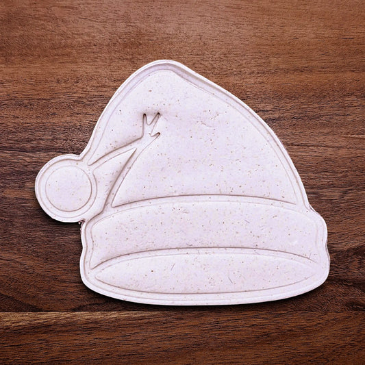 Santa hat cookie cutter and stamp dough cutout and imprint, perfect for Christmas cookies, festive fondant toppers, or Xmas holiday crafts.