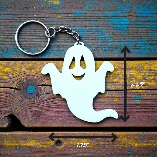 Handmade spooky Halloween ghost keychain in white, ideal for fall party favors, gifting, or accessorizing Halloween-themed trick or treat bags or keys.