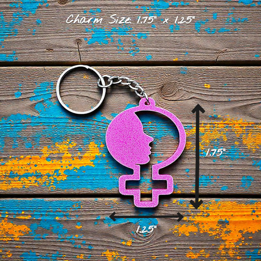 Handmade and customizable women empowerment keychain in magenta, perfect for event giveaways and gifts for feminists.