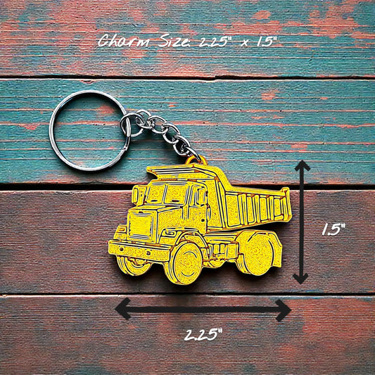 Handmade and customizable dump truck keychain in yellow, perfect for classroom prizes, party favors for kids birthdays, baby showers and unique backpack charms.