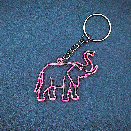 Hot pink elephant keychain shown front-facing with smooth detail, fun handmade charm for elephant lovers, kids, or wildlife party favors.