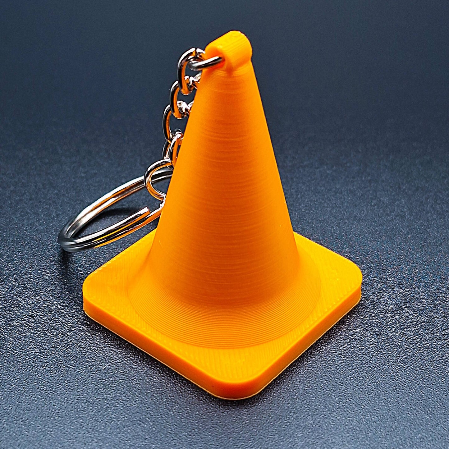 Classic orange mini traffic cone keychain, handmade from eco-friendly PLA plastic, great for road crew gifts or funny key rings.