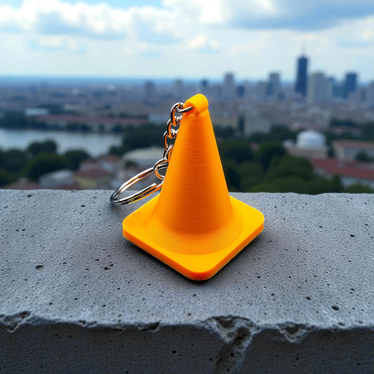 Traffic cone keychain, showing detailed shape and eco PLA material, ideal for gag gifts or themed sets.