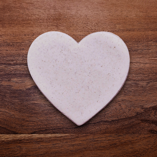 Heart-shaped cookie cutter making a clean cutout in dough – perfect for baking, Valentine’s cookies, fondant, or crafting with food-safe plastic cutter.