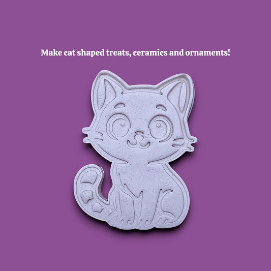 A light gray cat-shaped cookie cutter or mold centered on a solid purple background, with white text above reading 'Make cat shaped treats, ceramics and ornaments!'.
