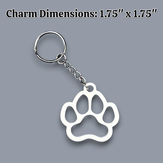 White paw keychain with clean silhouette, eco-friendly and handmade, ideal for honoring pets, gifting to animal lovers, or everyday use.
