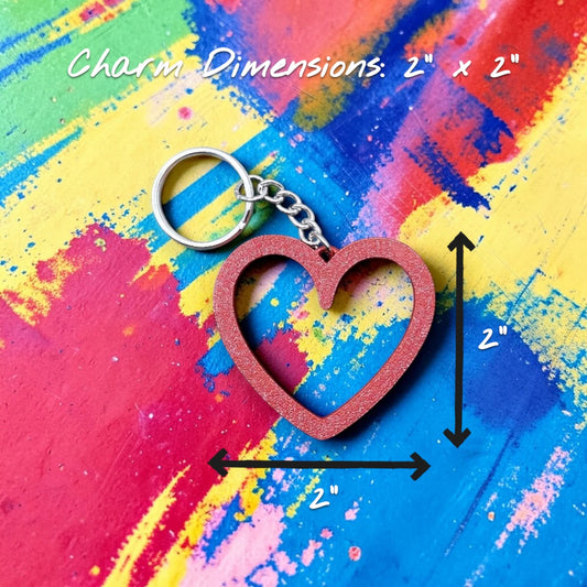 Heart keychain shown in maroon red with charm dimensions around the keychain, perfect for Valentine's Day gifts, wedding party favors, stocking stuffers and class prizes.