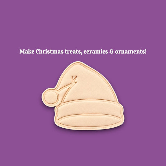 Santa hat cookie cutter and stamp dough cutout and imprint, perfect for Christmas cookies, festive fondant toppers, or Xmas holiday crafts.