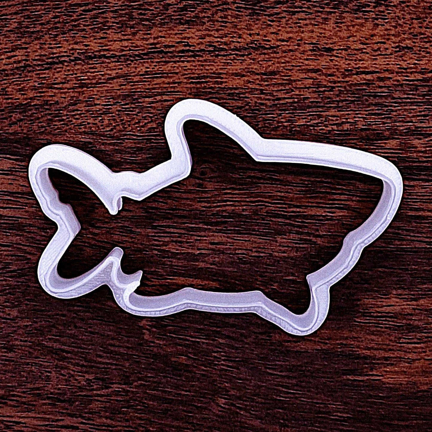 Shark cookie cutter with rounded detail. Great for centerpiece cookies, crafts, and beach-themed cookie platters.