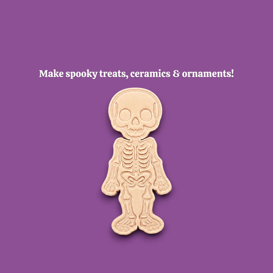 Stamped skeleton cookie dough with bone details. Perfect for Halloween cookies or creepy edible crafts.