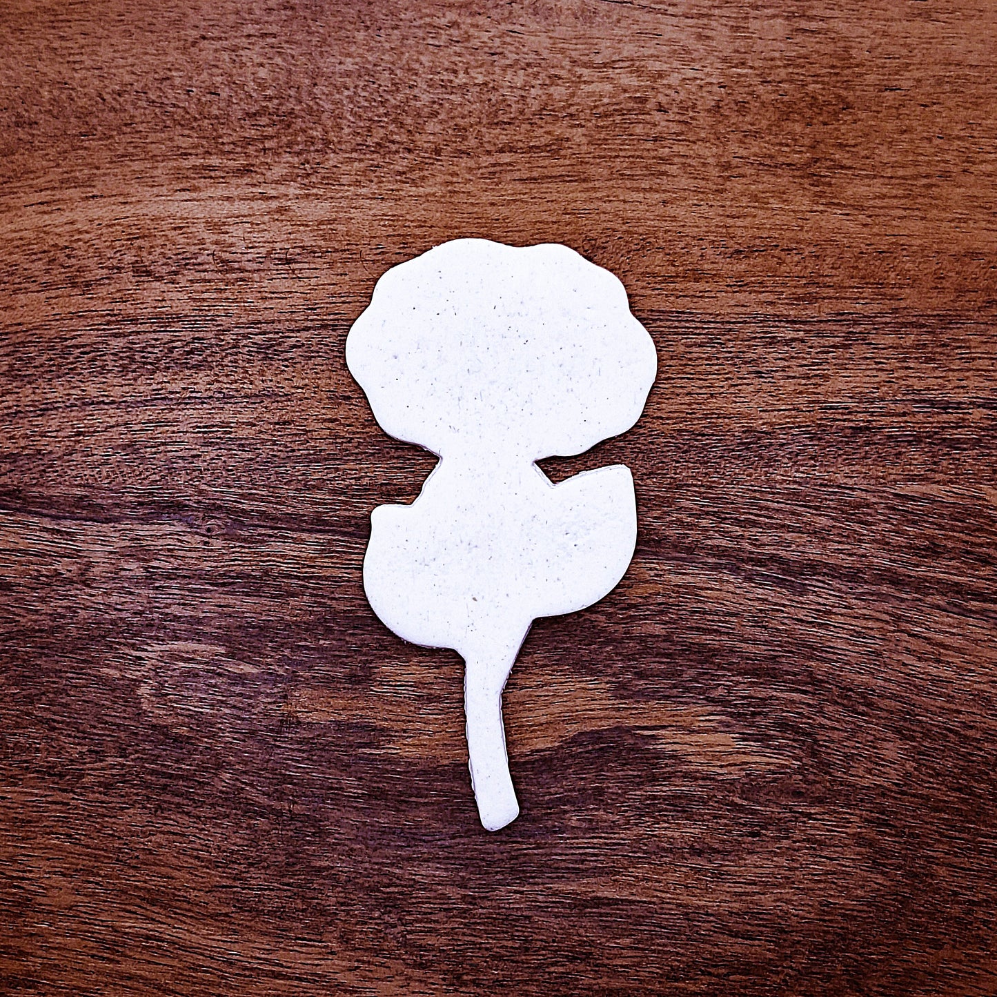 Baked dough cutout made with rose cookie cutter—great for wedding desserts, flower-themed cookies, and garden-inspired baked goods.