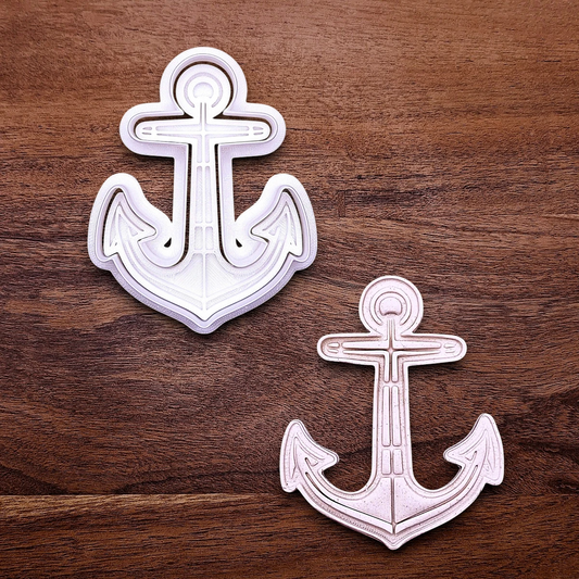 Anchor cookie cutter with matching stamp and dough cutout. Ideal for making detailed cookies, fondant toppers, or ocean party treats.