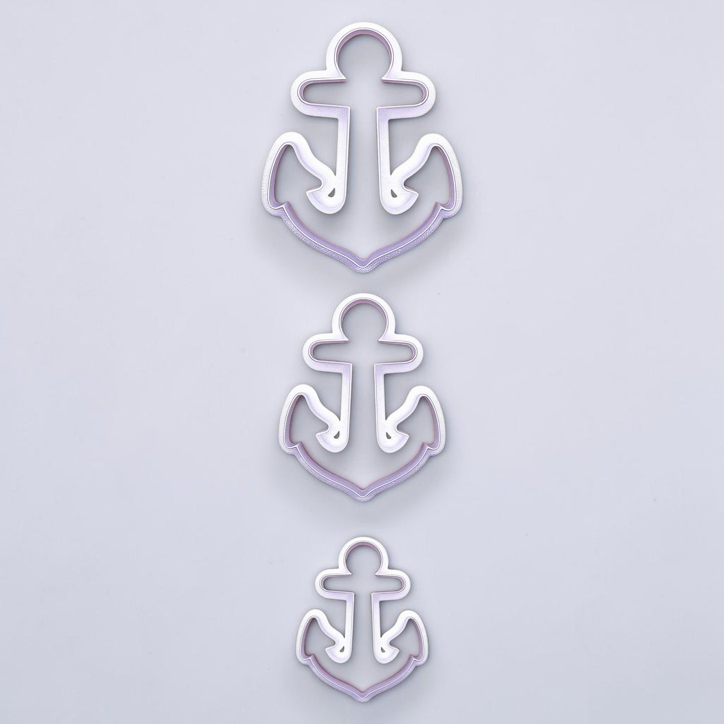 Set of three anchor-shaped cookie cutters in small, medium, and large. Great for nautical cookies, fondant toppers, or coastal crafts.