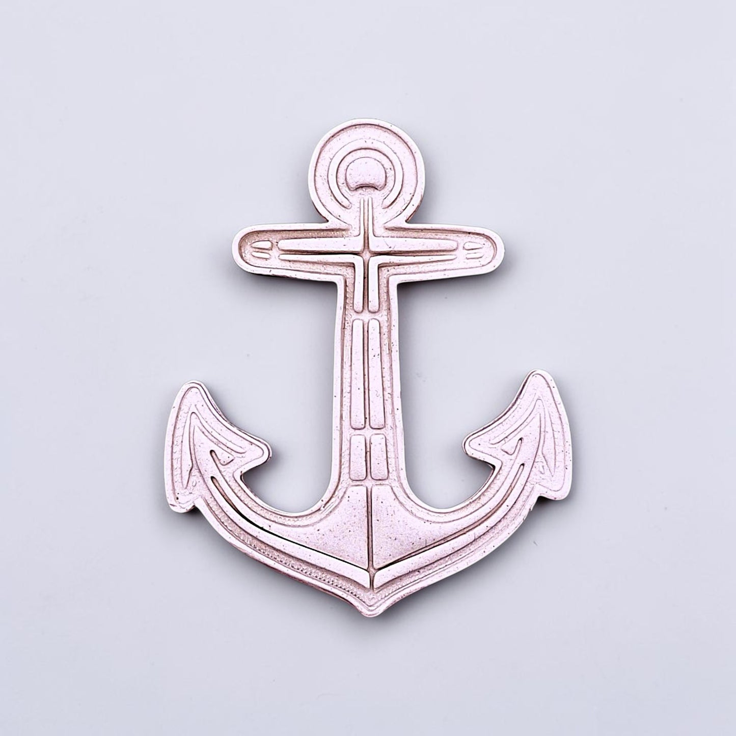 Anchor cookie dough cutout with stamped detail. Perfect for beach-themed cookies, nautical parties, weddings, or ocean-inspired bakes.