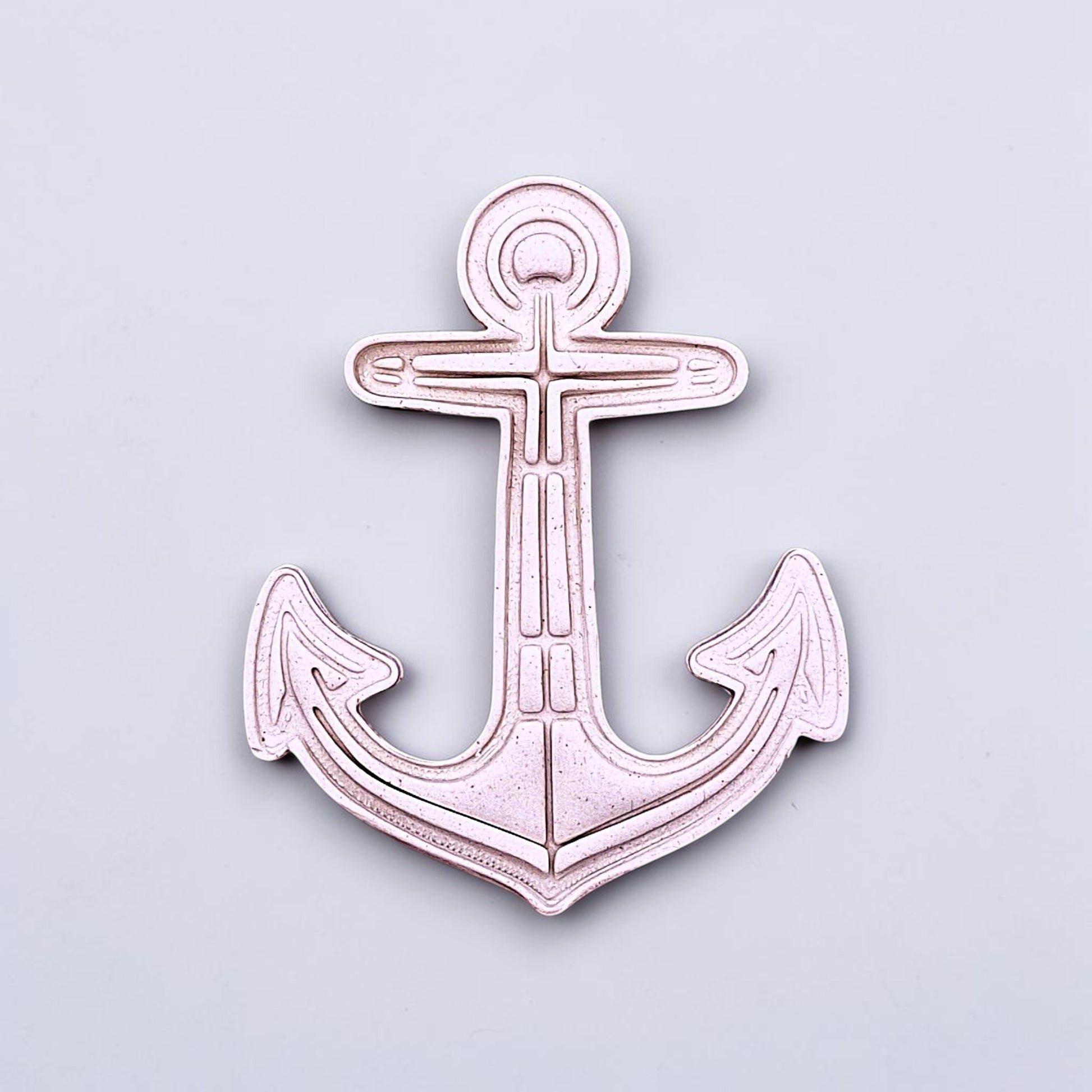Anchor cookie dough cutout with stamped detail. Perfect for beach-themed cookies, nautical parties, weddings, or ocean-inspired bakes.