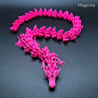 Magenta articulated dragon toy with smooth, movable segments, 3D printed in eco PLA plastic, ideal for stress relief and collectors.