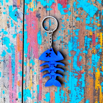 Handmade, customizable and articulated fish keychain in blue, featuring wiggly segments for sensory play, perfect as gifts for ocean lovers or fishermen.