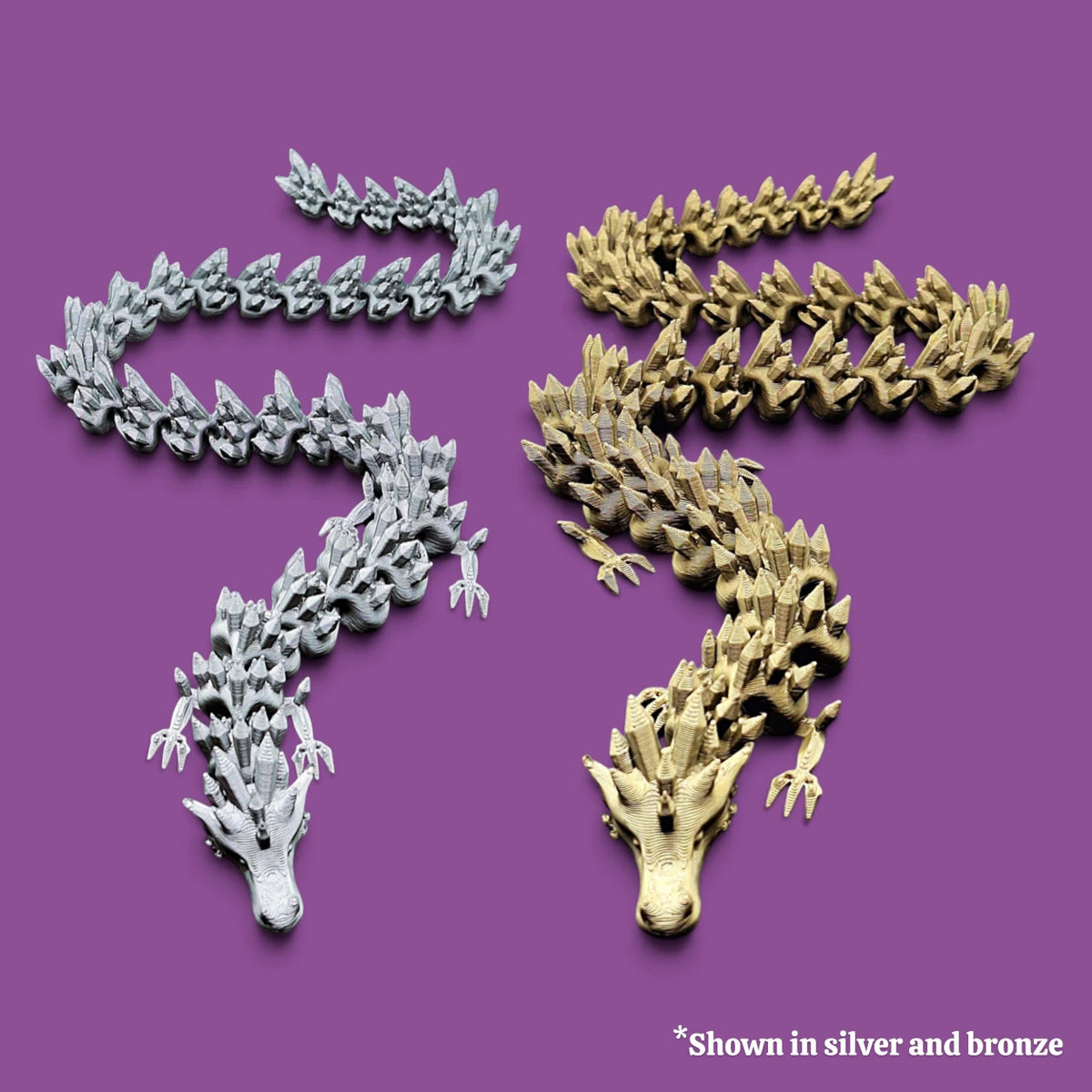 Silver and bronze articulated dragon fidget toy with fluid joints and sleek finish, made from plant-based PLA, available in multiple sizes.