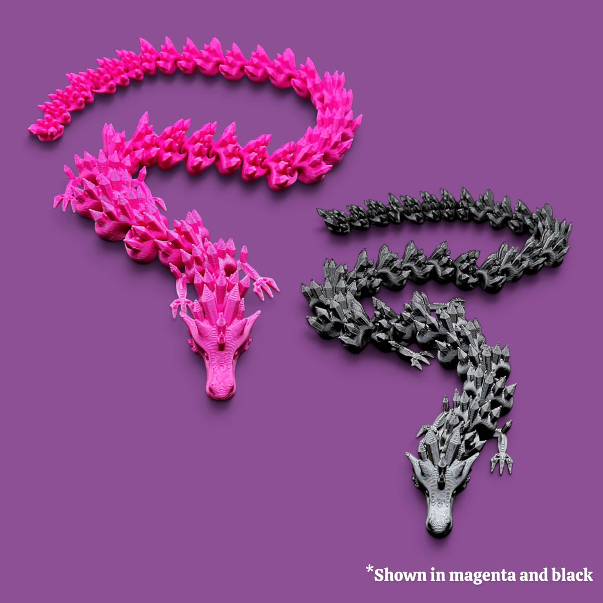 Magenta and black articulated dragon toys with smooth, movable segments, 3D printed in eco PLA plastic, ideal for stress relief and collectors.