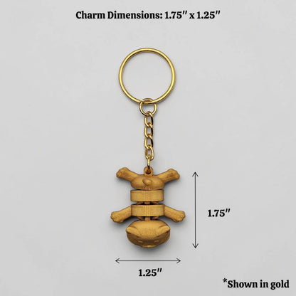 Cat keychain in gold alongside dimensions, customizable and handmade, perfect for classroom prizes, party favors and event giveaways.