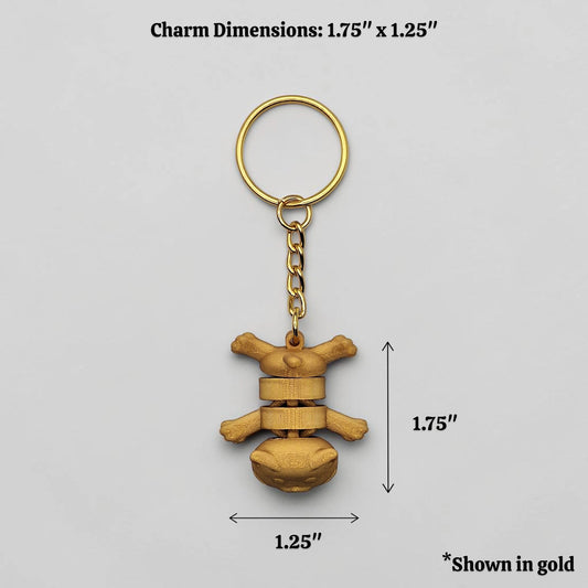 Cat keychain in gold alongside dimensions, customizable and handmade, perfect for classroom prizes, party favors and event giveaways.