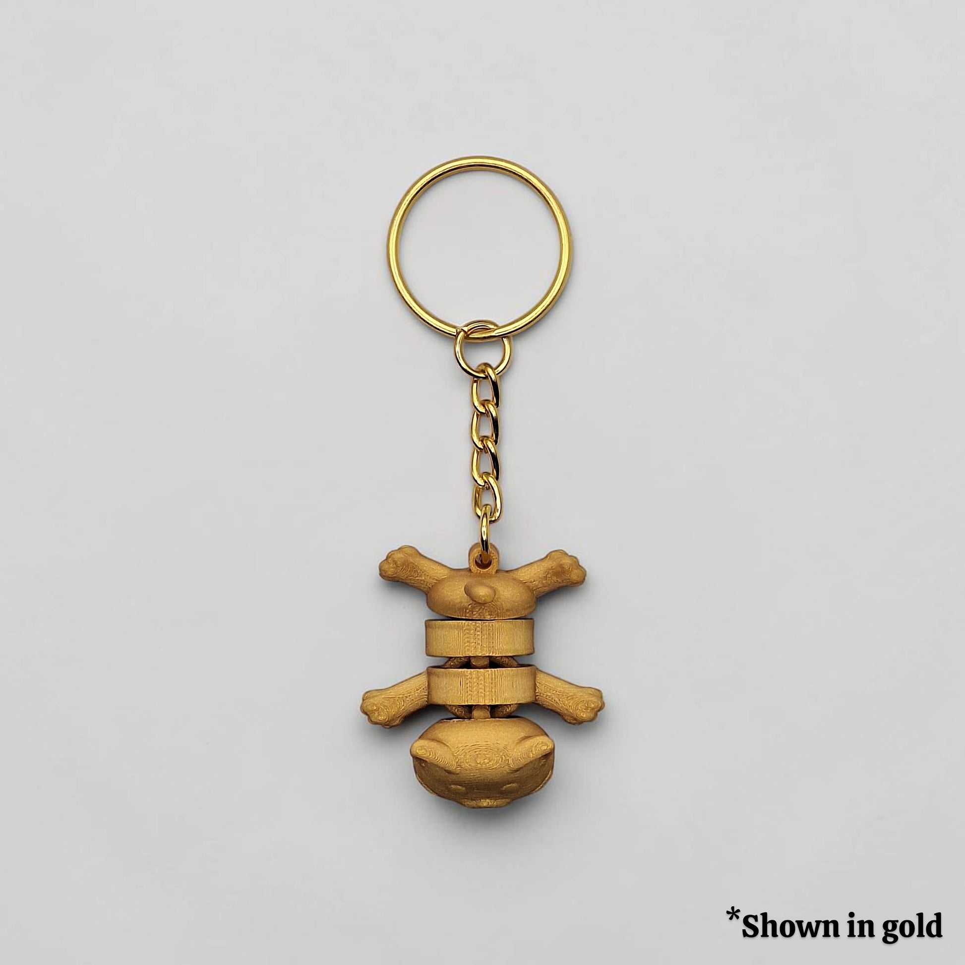 Cat keychain in gold, customizable and handmade, perfect for classroom prizes, party favors and event giveaways.