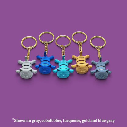 Cat keychains in multiple colors, customizable and handmade, perfect for classroom prizes, party favors and event giveaways.