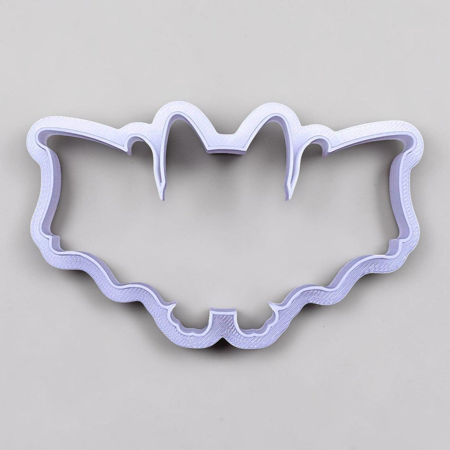 Bat-shaped cookie cutter, great for Halloween baking, haunted house parties, and bat-themed cookie trays or crafts.