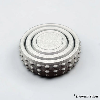 Fidget and gyro spinner in silver, perfect for party favors, event giveaways, classroom prizes and promotional items. Customizable in 30 colors and handmade in USA.