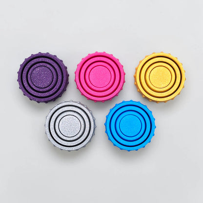 Bulk fidget and gyro spinners in multiple colors, perfect for party favors, event giveaways, classroom prizes and promotional items. Customizable in 30 colors and handmade in USA.