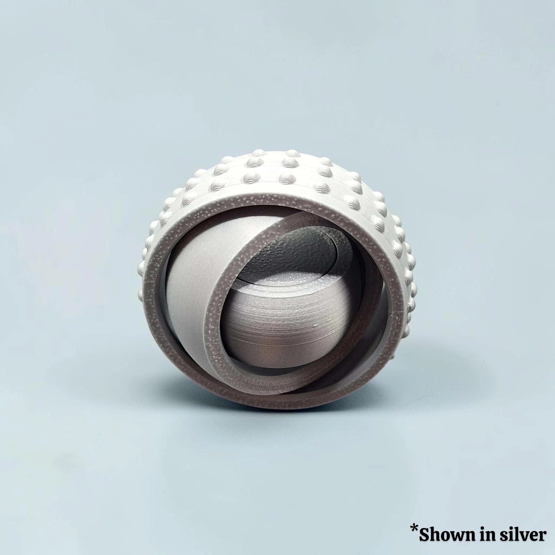 Fidget and gyro spinner in silver, perfect for party favors, event giveaways, classroom prizes and promotional items. Customizable in 30 colors and made in USA.