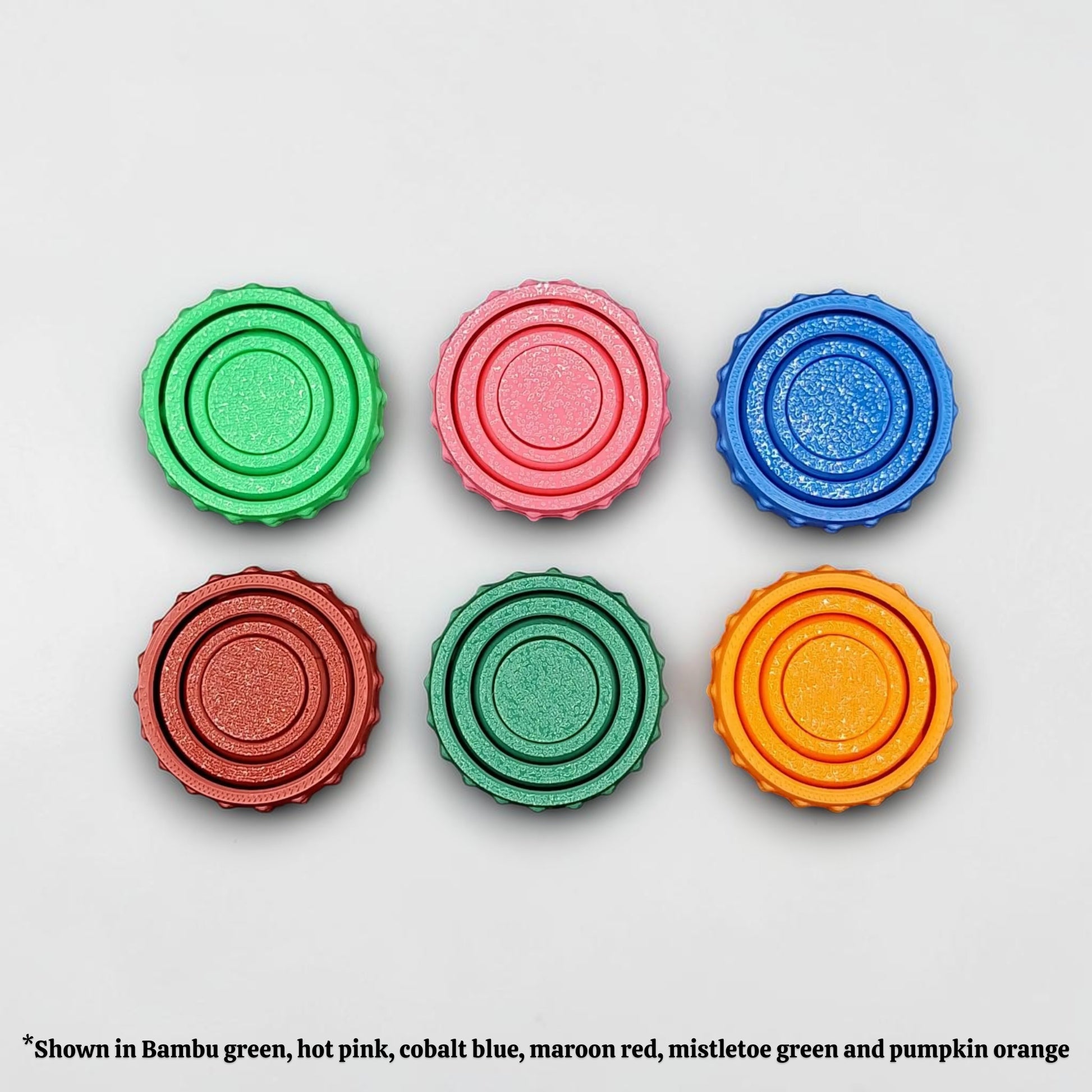 Bulk fidget and gyro spinners in multiple colors, perfect for party favors, event giveaways, classroom prizes and promotional items. Customizable in 30 colors and handmade in USA.