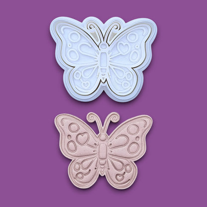 Handmade and customizable butterfly cookie cutter stamp and dough cutout and imprint, perfect for spring baking, garden party treats, birthdays, events, weddings, fondant decorations, and whimsical cookie designs.